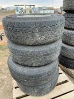 Set of four tires on aluminum rims