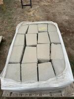 Pallet of gray retaining wall concrete block