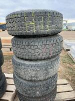Set a four tires on Jeep rims and one like new tire