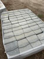 Pallet of mid grey retaining wall concrete blocks