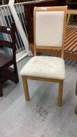 WHITE CUSHIONED CHAIR