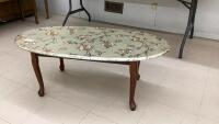 OVAL COFFEE TABLE COVERED W/ WALL PAPER