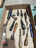 Flat of antique leatherworking tools