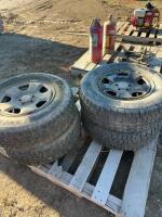 Four Avalanche winter tires on Subaru rims