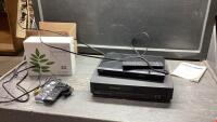 BOX W/VHS + DVD PLAYER AND A TELUS WIRELESS GATEWAY