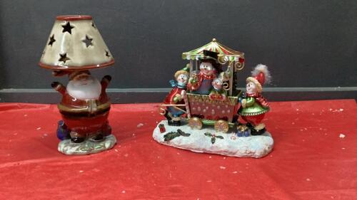 POLYRESIN SNOWMAN FAMILY IN CART & PORCELAIN SANTA TEA LIGHT HOLDER
