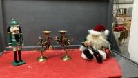 (2) BRASS "HORN" CANDLE STICKS, WOOD NUTCRACKER AND SITTING SANTA
