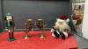 (2) BRASS "HORN" CANDLE STICKS, WOOD NUTCRACKER AND SITTING SANTA