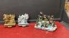 (2) HEAVY RESIN STOCKING HOLDERS W/ CAST BASES AND LIGHTED SNOW VILLAGE