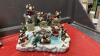 (2) HEAVY RESIN STOCKING HOLDERS W/ CAST BASES AND LIGHTED SNOW VILLAGE - 2