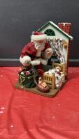 KIRKLAND FABRIC MACHE SANTA BY CHILD