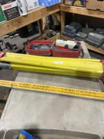 Transit tripod and measuring stick