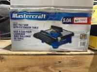 Wet tile saw with extension table