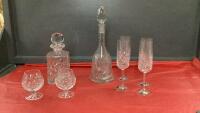 PINWHEEL DECANTER W/ (4) CHAMPAGNE GLASSES AND CRYSTAL DECANTER W/ (2) BRANDY SNIFTERS