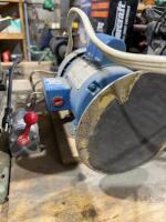 Electric motor with sanding wheel