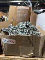 Box of new tire chains and 30' of chain light underneath