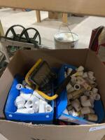 Box of PVC fittings and valves
