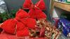BOX OF CHRISTMAS DECOR - GARLAND, LARGE RED BOWS, RIBBON, BOWS - 2