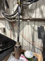Tiger, torch, and hose