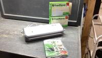 FOOD SAVER VACUUM SEALING MACHINE + EXTRA BAGS