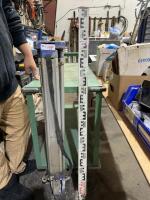 Surveyors tripod and extendible stick