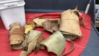BUCKET OF LEATHER PIECES