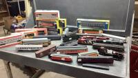 BOX OF MODEL TRAIN CARS + LOCOMOTIVES