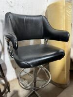 Padded chrome swivel chair