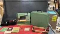 VINTAGE ELNA PORTABLE SEWING MACHING IN METAL CASE