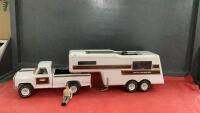 VINAGE TONKA TRUCK W/ 5TH WHEEL TRAILER AND MALE FIGURINE