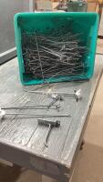 TOTE FULL OF PEG BOARD HOOKS