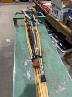 Bundle of wooden crutches and walking canes