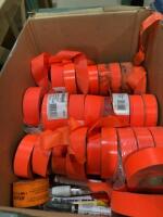 Box of red fluorescent tape