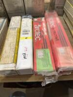 Four tubes of welding rod