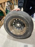 Goodyear, 15 inch tire on five bolt steel rim