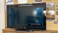 SONY BRAVIA 40" FLAT SCREEN TV ON STAND W/ REMOTE