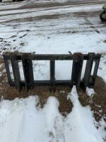 Loader bail spear