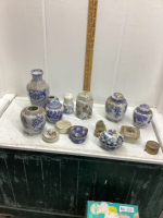 COLLECTION OF BLUE AND WHITE CONTAINERS
