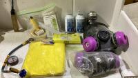 BOX WITH 2 RESPIRATORS, XL PVC RAIN SUIT, DURACOOL SEAL QUICK, ROLLER CHAIN TOOL AND MISC