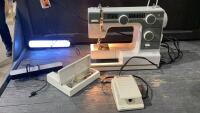 JANOME SEWING MACHINE + (2) USB SMALL LIGHTS