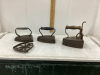 3 ANTIQUE SAD IRONS AND 1 STAND