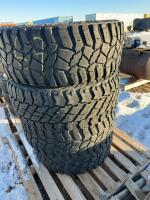 Stack of four heavy tires