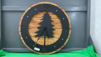 ROUND METAL CLOCK ON WOOD BACKING