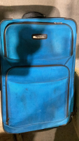 TRACKER - SUIT CASE & CONTENTS