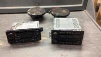 (2) USED CAR STEREOS - RADIO/TAPE/CD + 2 SPEAKERS