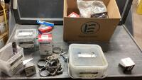 A LOT OF HOSE CLAMPS - ASSORTED STYLES, VALVE WRENCH, BATTERY HOLD DOWN