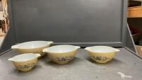 SET OF (4) VINTAGE PYREX BOWLS - BLUE FLORAL PATTERN ON LIGHT BROWN BACKGROUND