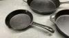(3) CAST IRON PANS - WOODS , LAGASTINA AND SMALL ONE IS UNMARKED - 4