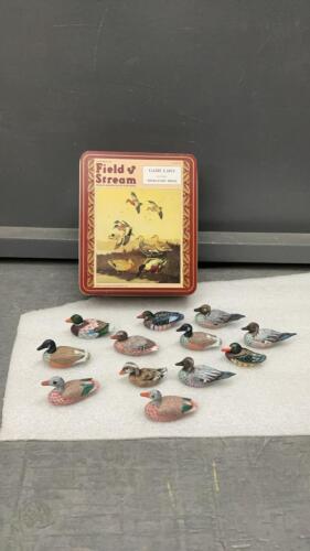 (12) MINI HAND CARVED WOOD DUCKS IN FIELD & STREAMS TIN BOX