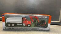 KUBOTA PETERBILT DUMP TRUCK AND KX080-4 EXCAVATOR